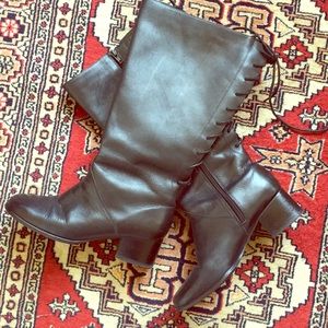 Lace-up knee high black leather boots